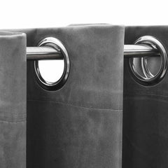Gray velvet blackout curtains with metal rings, shown as a 2-pack pair.