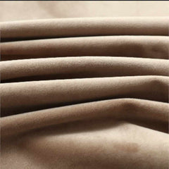 Close-up of beige velvet fabric folds from Bostome blackout curtains.