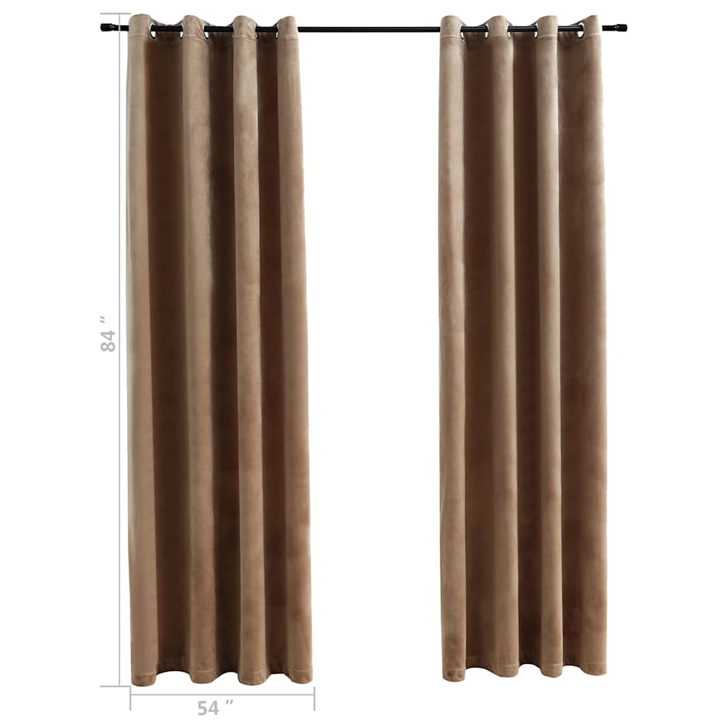 Pair of beige velvet blackout curtains, 54x84 inches each, with rings on a rod.