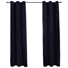 Two black velvet blackout curtain panels with rings, each measuring 37 by 63 inches.
