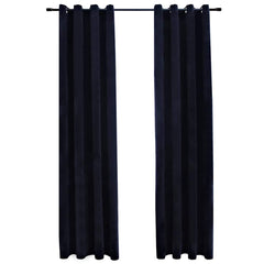 Two black velvet blackout curtain panels with rings, each 54x63 inches.