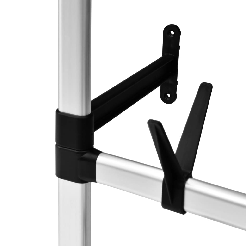 Silver telescopic aluminum shoe rack with black rods and hooks mounted on a pole.