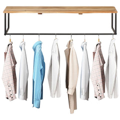Wooden wall shelf with live edge acacia top and black metal hanging rod displaying shirts.
