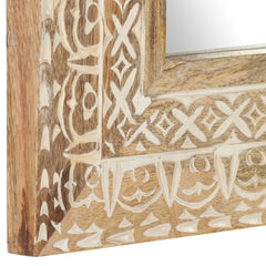 Square hand-carved mango wood mirror with intricate white patterns on a natural wood frame.
