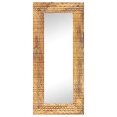 Tall rectangular mirror with hand-carved mango wood frame featuring zigzag patterns.