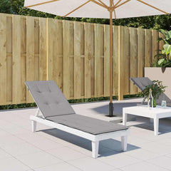 Gray Oxford fabric deck chair cushion with ties, on a white lounger by a wooden fence.