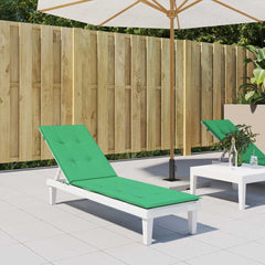 Green water-resistant Oxford fabric cushion on a white deck chair in an outdoor patio setting.
