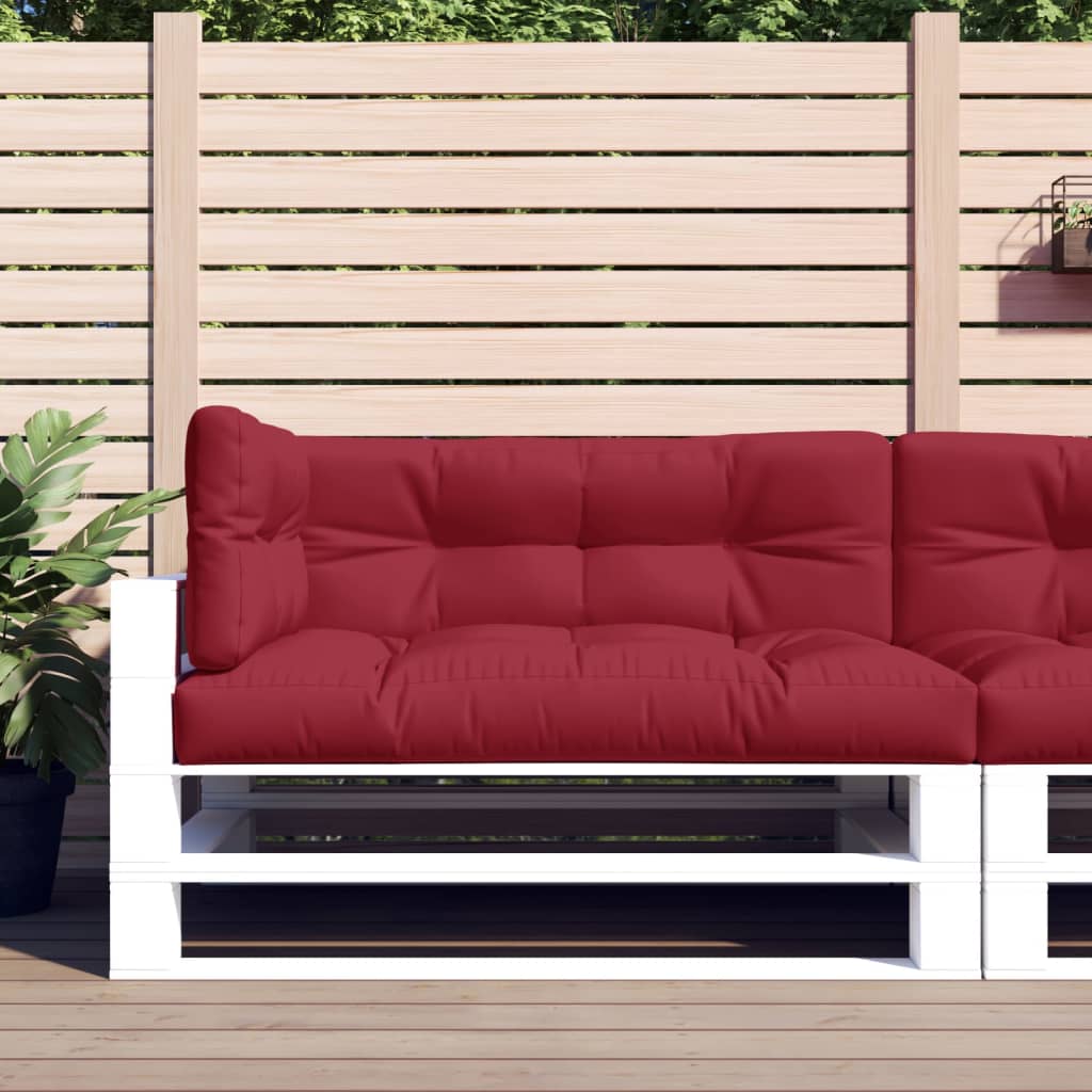 Three wine red polyester pallet cushions with soft filling, ideal for outdoor seating.