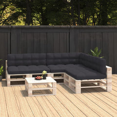 Anthracite fabric cushions on a 7-piece pallet sofa set with coffee table on a wooden deck.