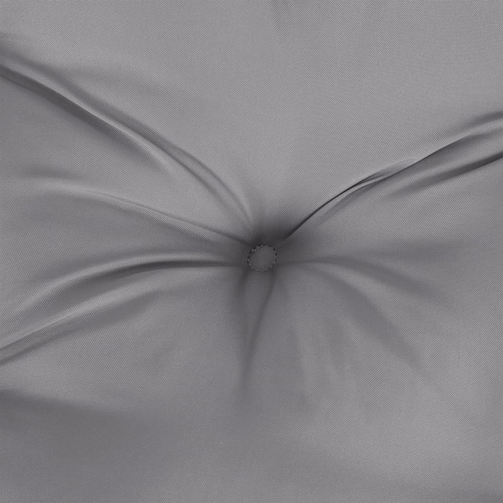 Close-up of a tufted gray polyester cushion.