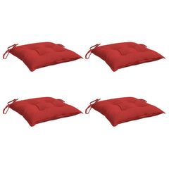 Four red square chair cushions with ties are arranged on a white background.