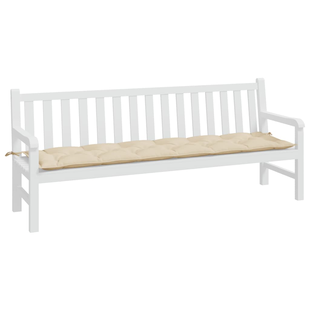 A white garden bench with a long, tufted beige cushion secured by ties.