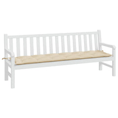 A white garden bench with a long, tufted beige cushion secured by ties.