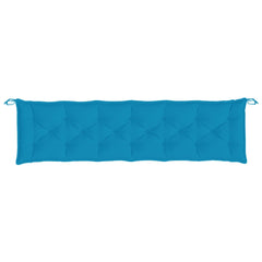 A light blue tufted garden bench cushion with ties on both ends.