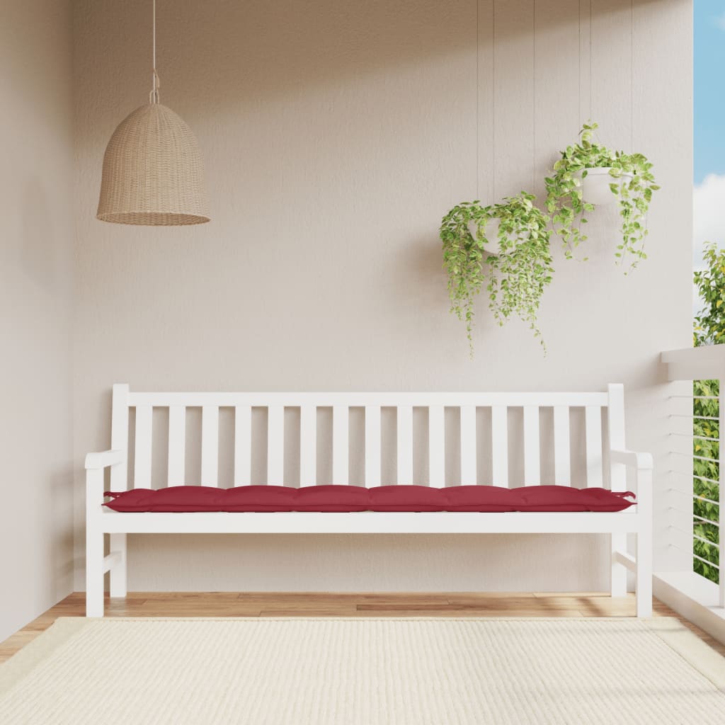 Wine red Oxford fabric garden bench cushion, 78.7x19.7x2.8 inches, on white bench.