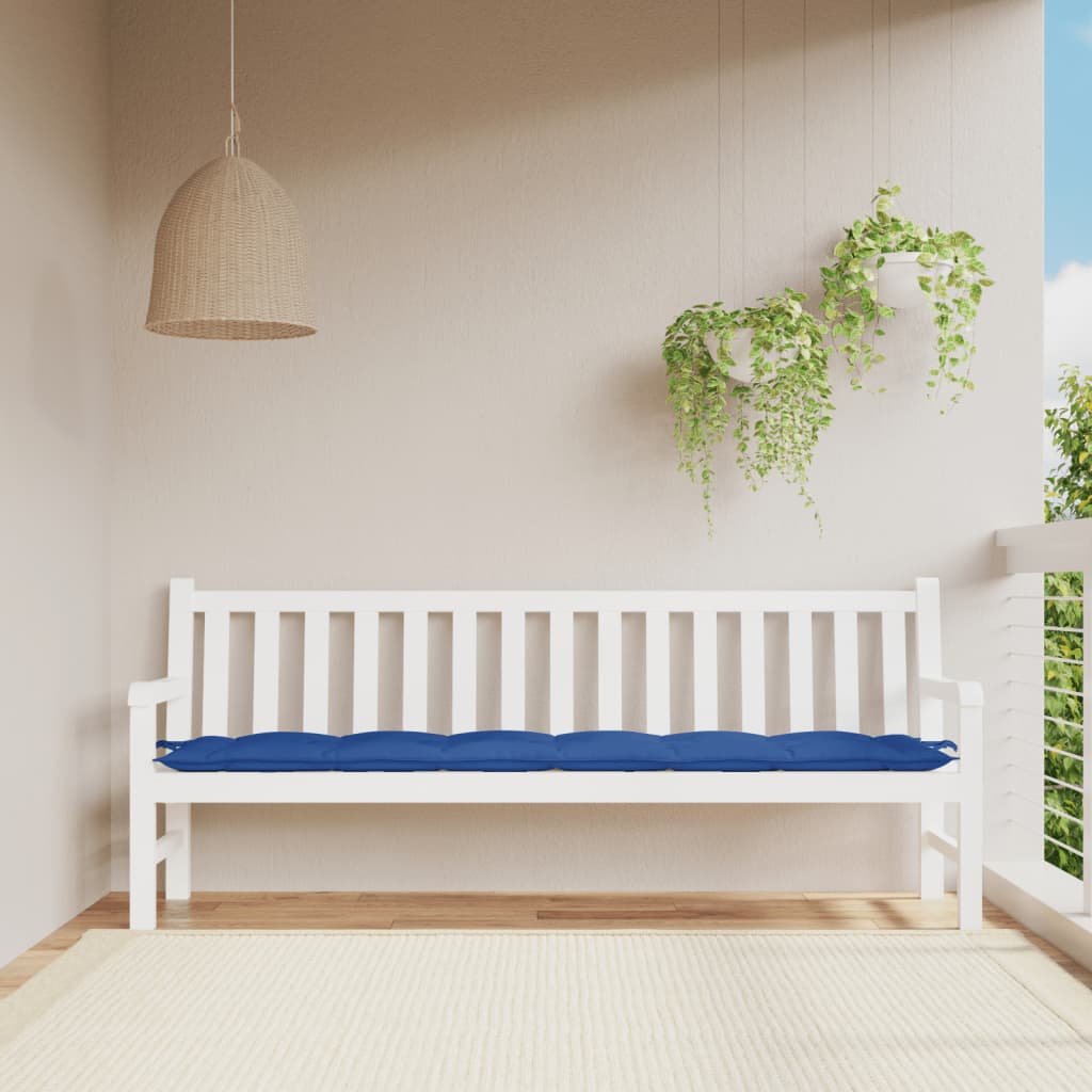 Blue Oxford fabric garden bench cushion on a white outdoor bench.