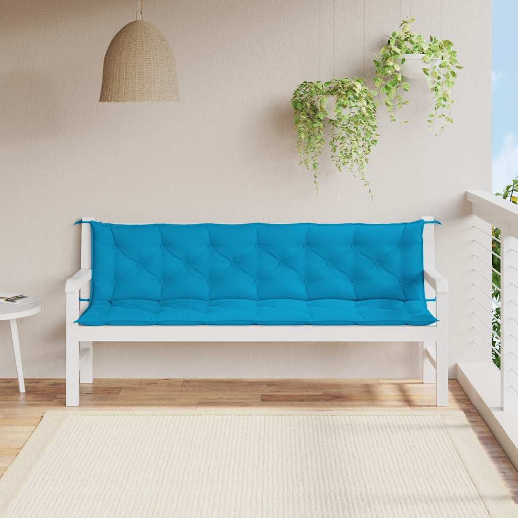 Light blue Oxford fabric garden bench cushion on a white outdoor bench.