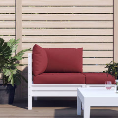 A 3-piece set of wine red Oxford fabric cushions on a white pallet sofa with plants and a table.