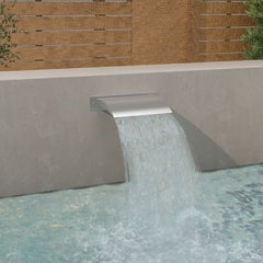 Silver stainless steel pool fountain cascading water into a pool, 17.7x10.2x5.1 inches.