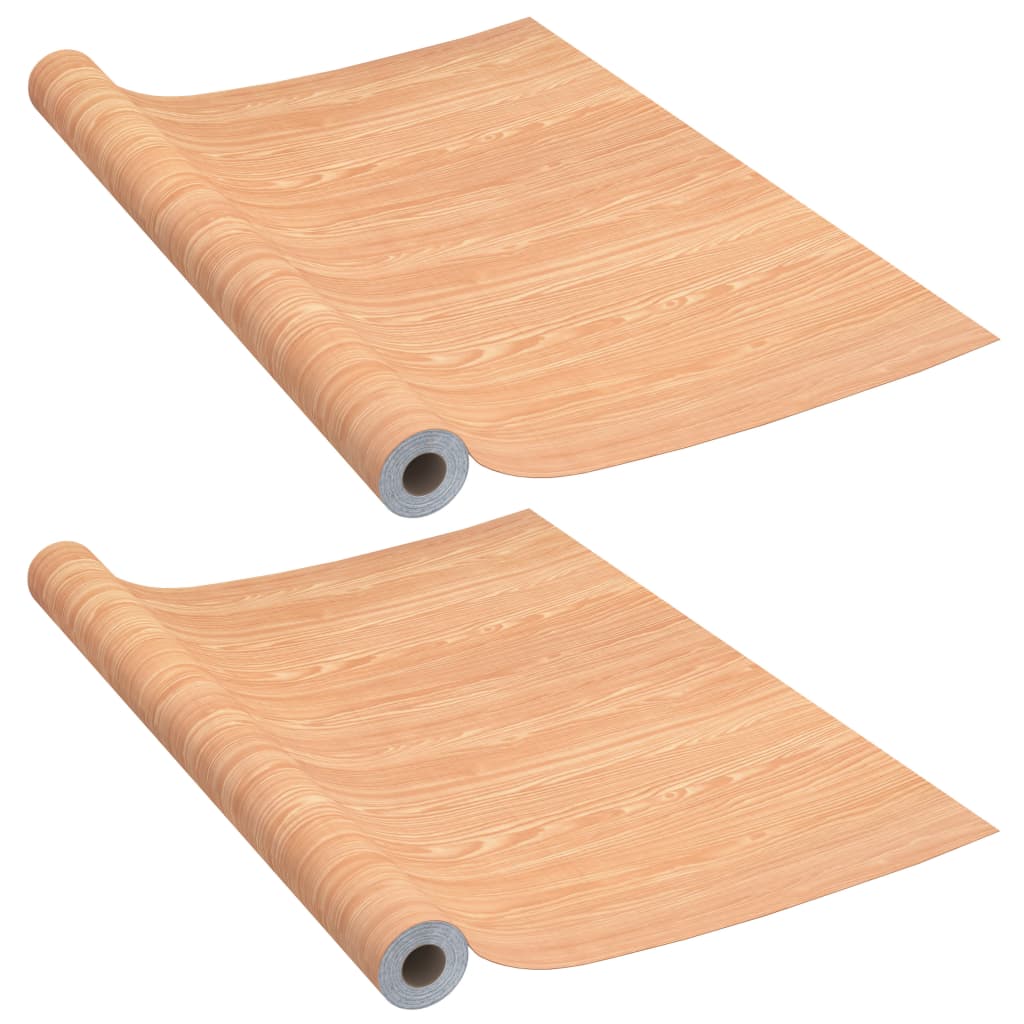 Self-adhesive PVC film in Ahorn wood-look, perfect for doors and furniture, in two rolls.