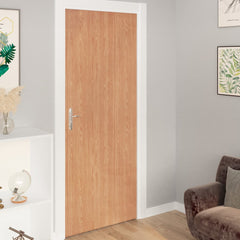 Self-adhesive PVC film in Ahorn wood-look, ideal for doors and furniture, in two rolls.