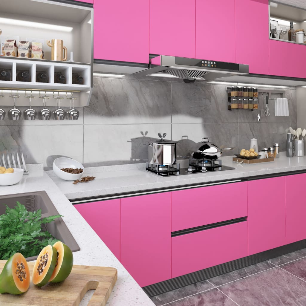 Modern pink kitchen cabinets with glossy finish, showcasing self-adhesive PVC film application.