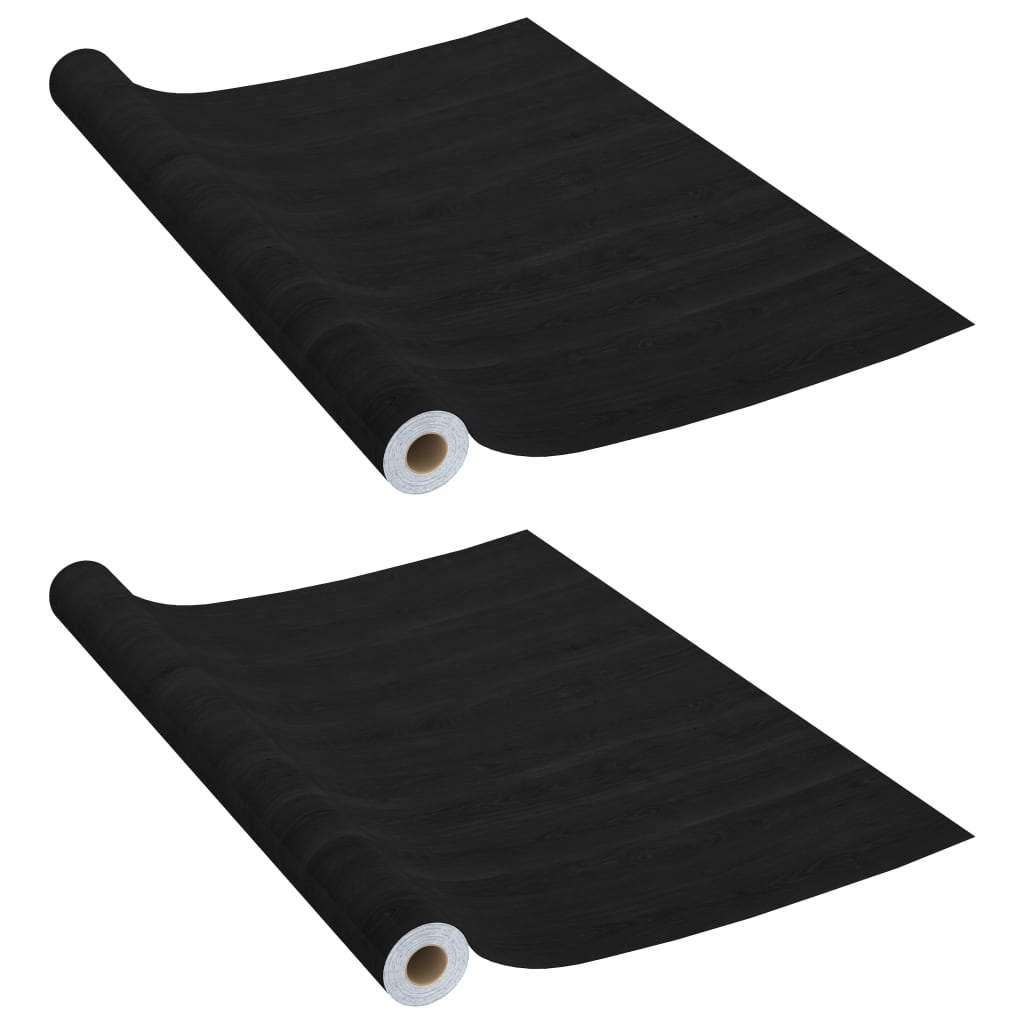Two rolls of self-adhesive dark wood grain PVC film for furniture.