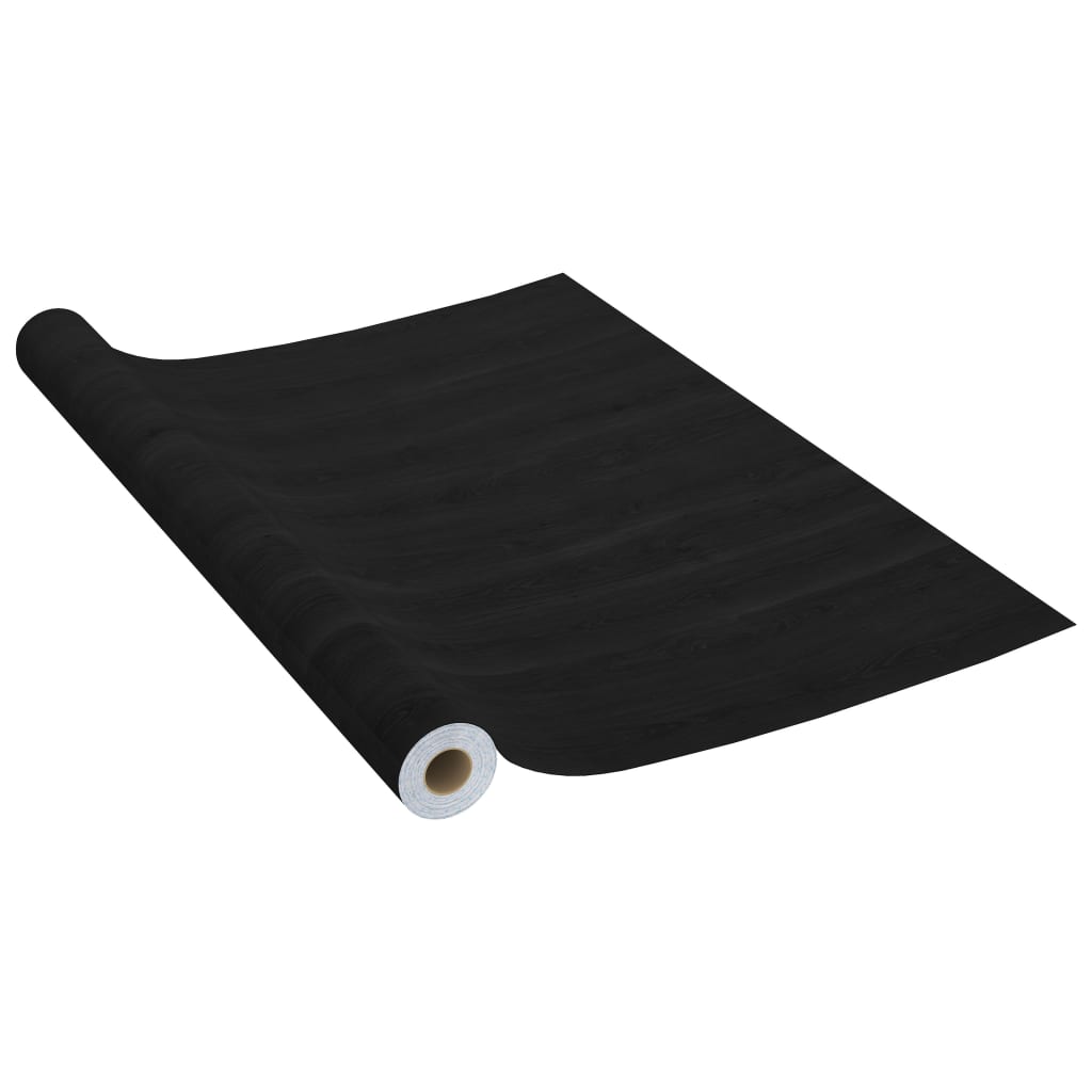 Two rolls of self-adhesive dark wood grain PVC film for furniture.