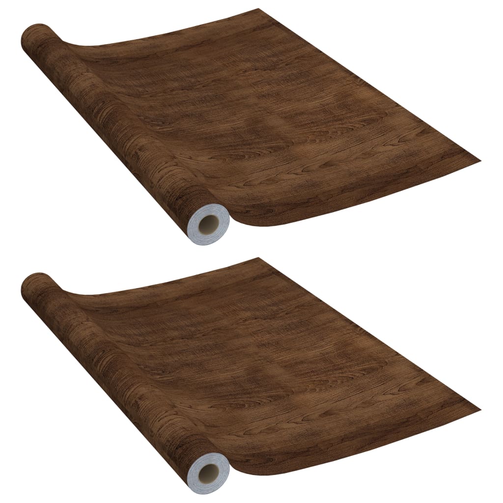 Two rolls of self-adhesive dark oak PVC film for furniture, each 196.9x35.4 inches.