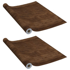 Two rolls of self-adhesive dark oak PVC film for furniture, each 196.9x35.4 inches.