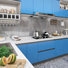 Modern kitchen with azure blue cabinets and white countertops, refreshed using self-adhesive PVC films.