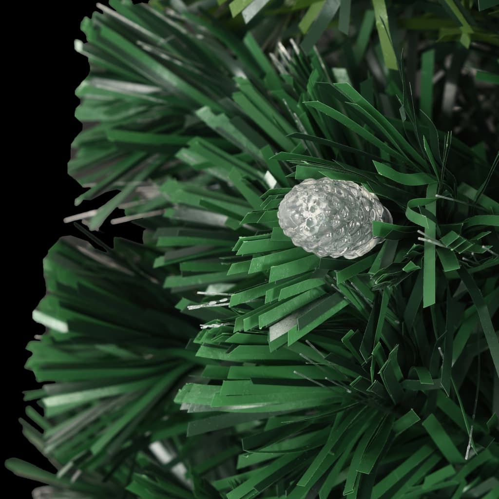 A 6 ft pre-lit fiber optic Christmas tree with green branches, white tips, and a stand.