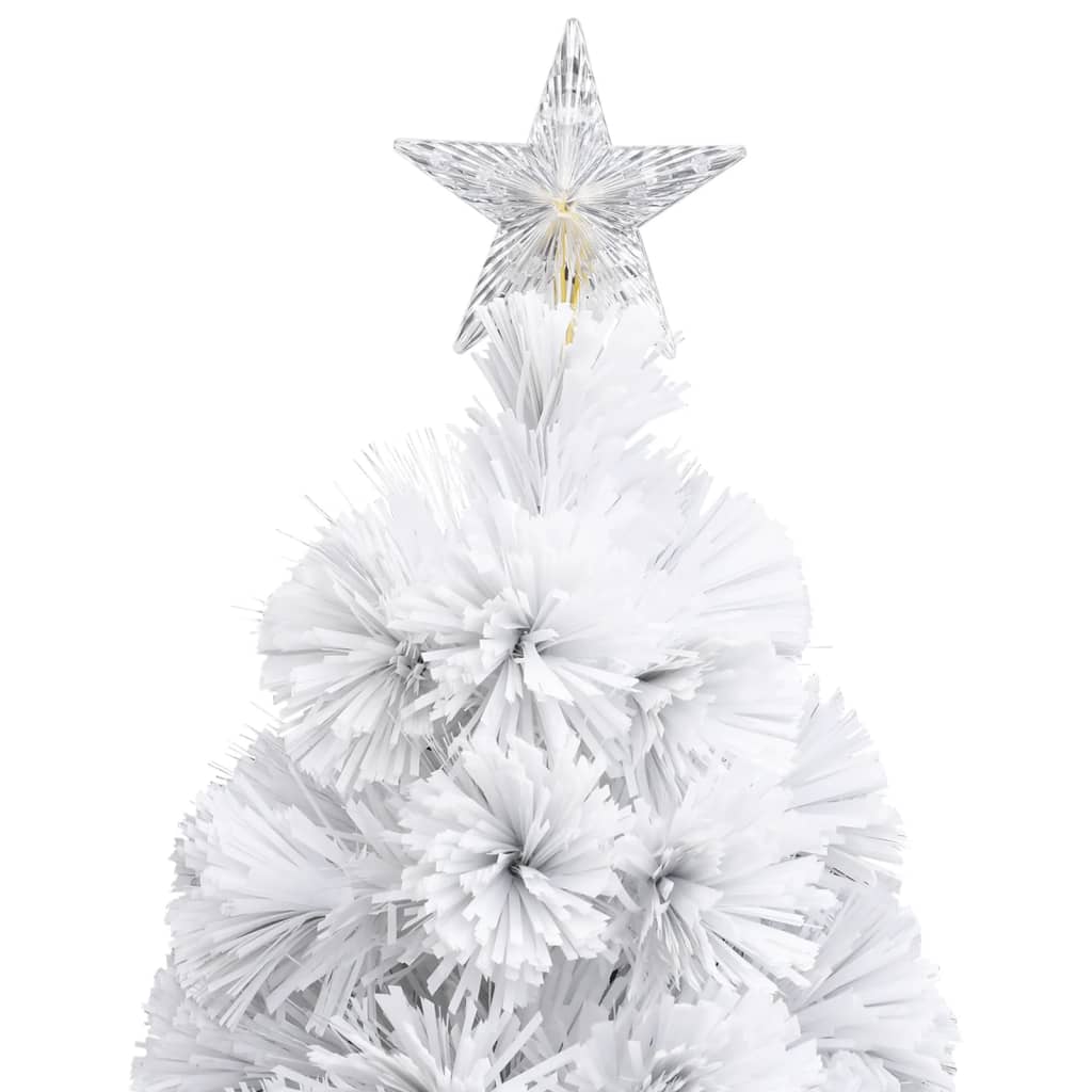 A white artificial Christmas tree with a clear star topper.