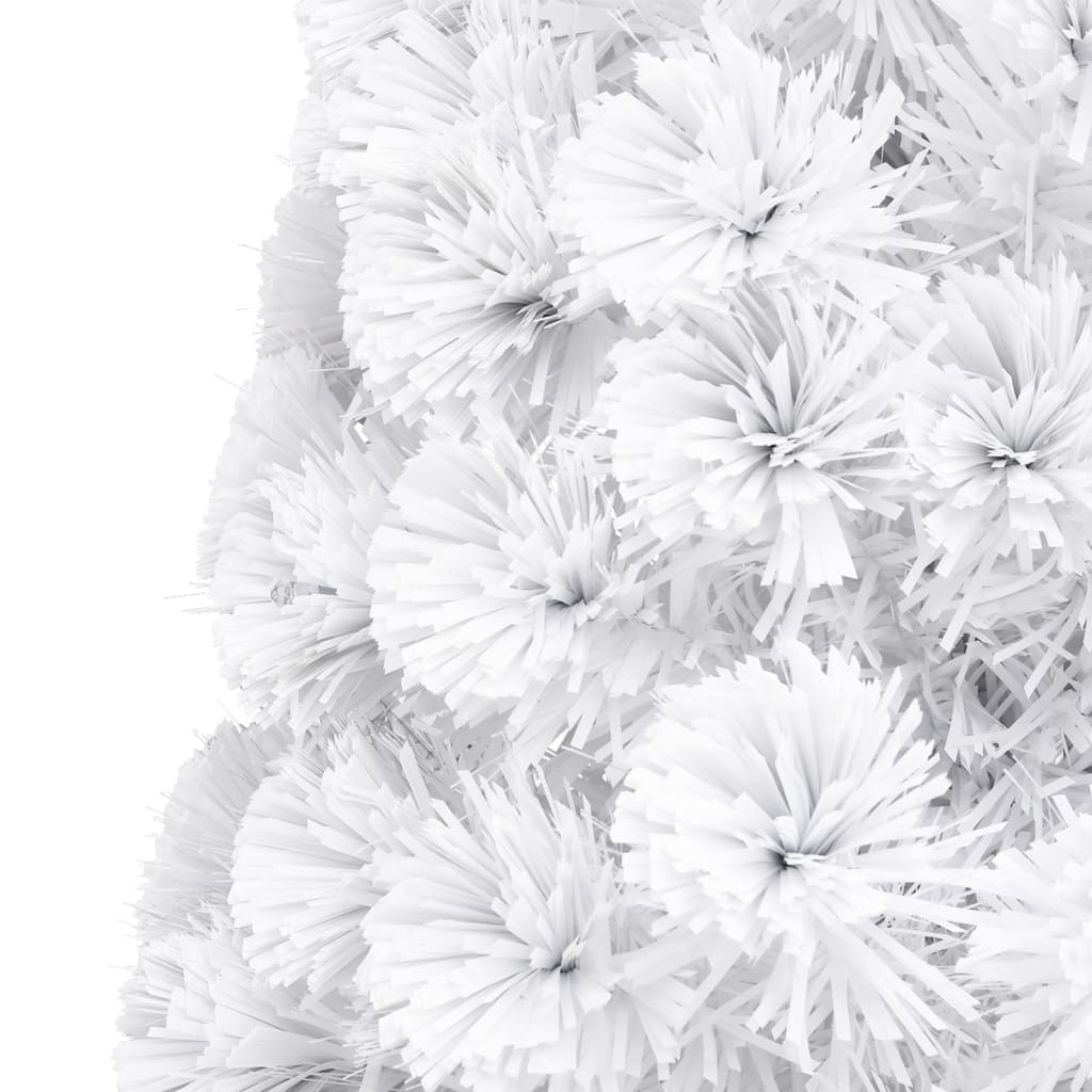 A 7ft white pre-lit artificial Christmas tree with fiber optic branches and LED lights.