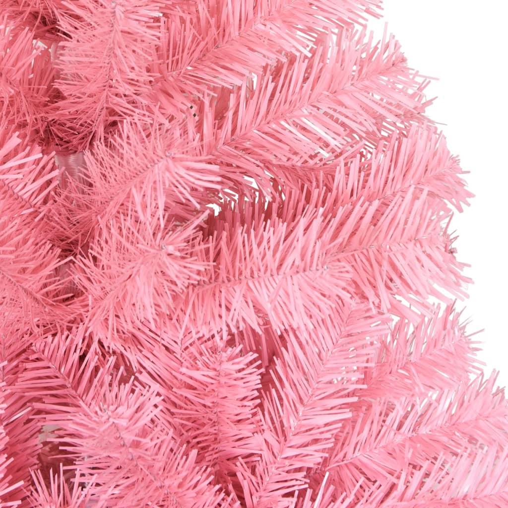 An 8-foot pink PVC artificial Christmas tree with stand, featuring full branches.