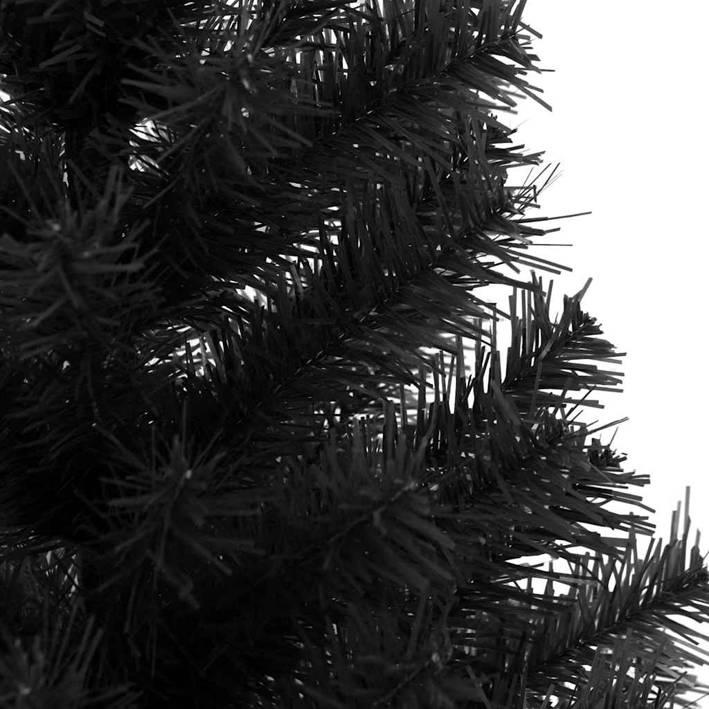 A 4 ft black artificial Christmas tree with PVC stand and lush PVC branches.