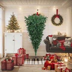 A 6-foot green artificial upside-down Christmas tree on a stand in a cozy holiday living room with gifts and decorations.