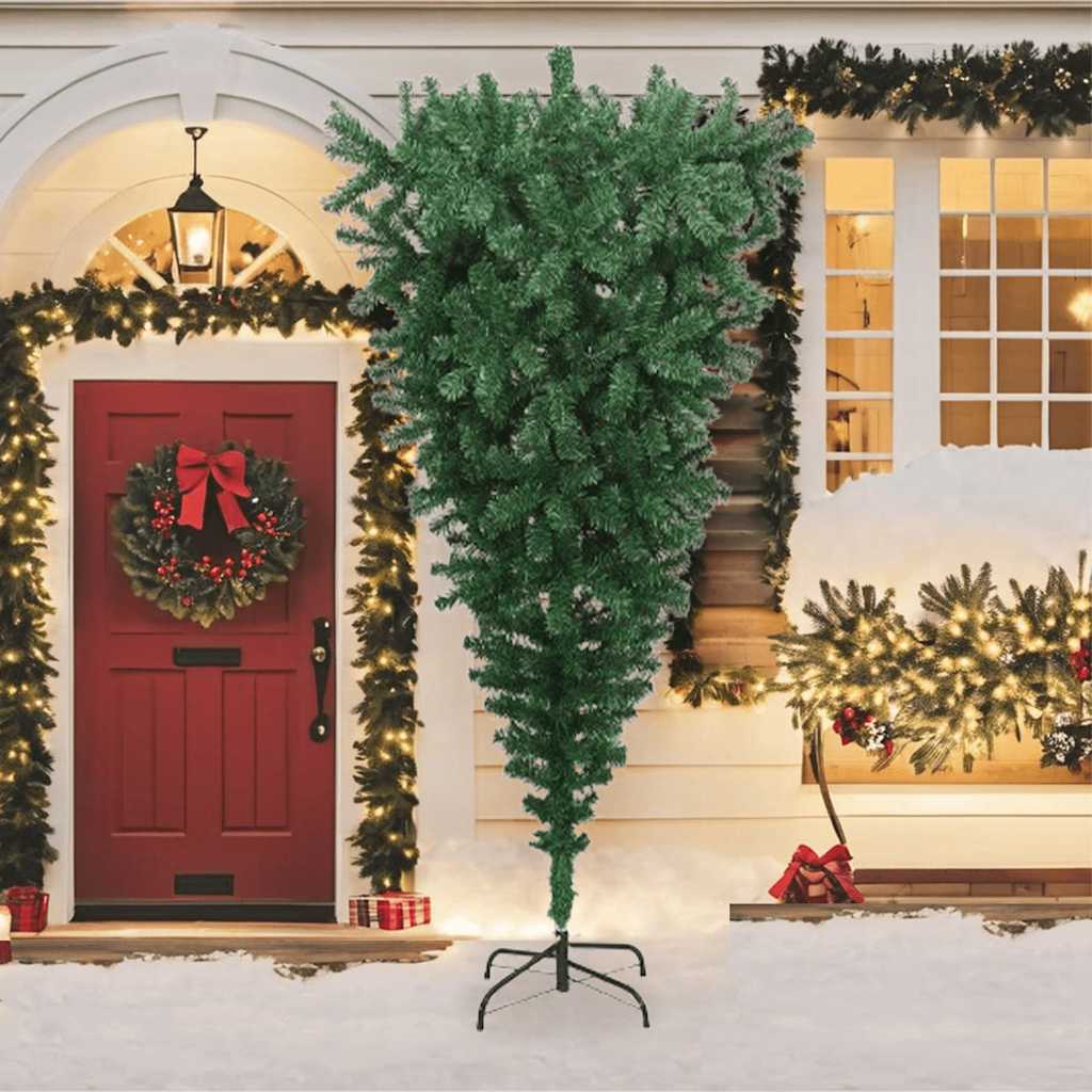 An 8-foot green upside-down artificial Christmas tree with a metal stand on a snowy porch.
