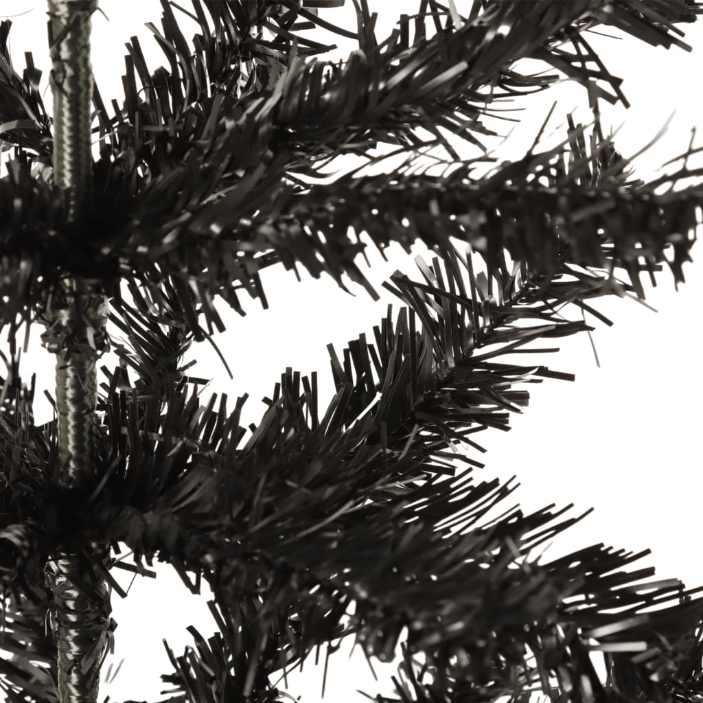 Slim 4 ft black artificial Christmas tree made of PVC with dense branches.