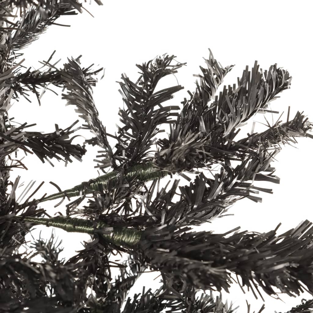 A 6 ft slim black PVC artificial Christmas tree with dense, dark branches.