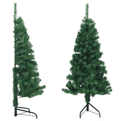A 5 ft green PVC artificial Christmas tree in corner design with metal stand, shown upright and angled.