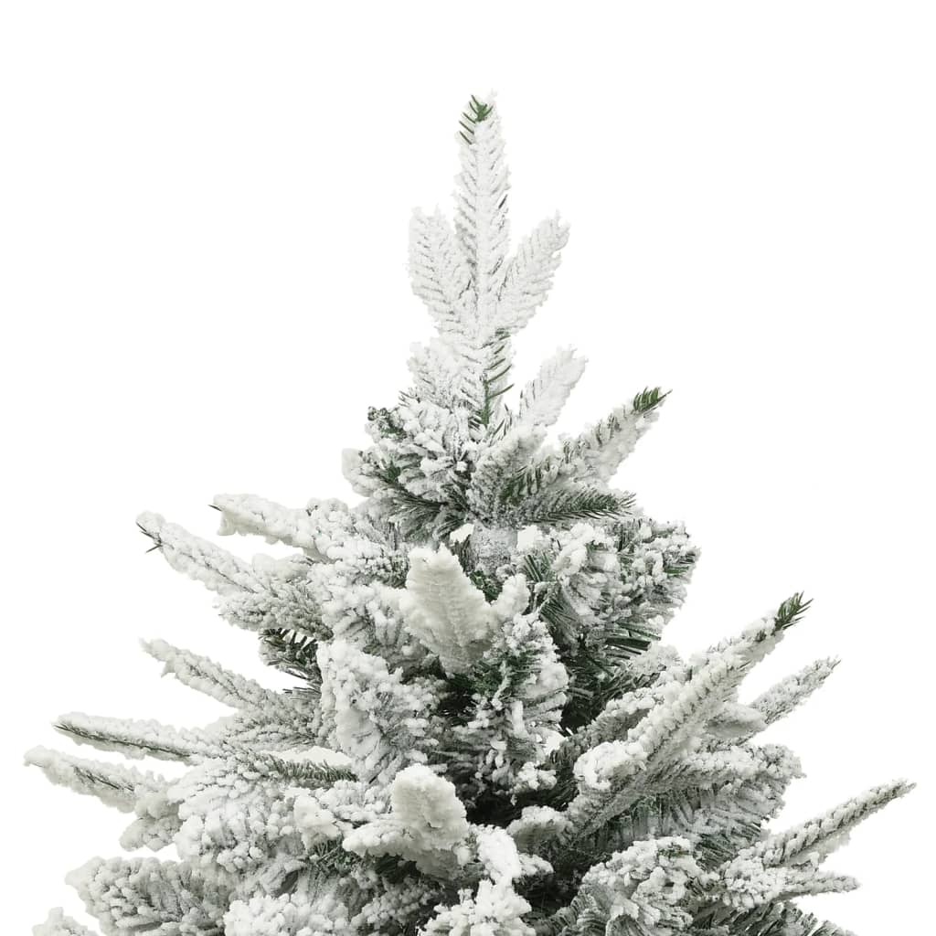 A 7.5ft green artificial Christmas tree with flocked snow on PVC and PE branches.
