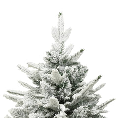 A 7.5ft green artificial Christmas tree with flocked snow on PVC and PE branches.