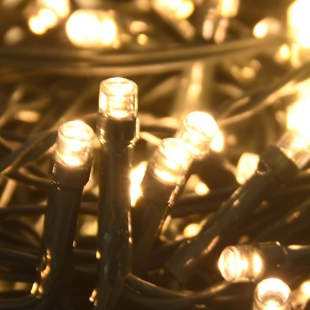 Tangled string of 150 warm white LED lights with glowing bulbs on black wires.