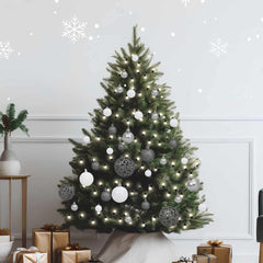 White and gray shatterproof Christmas ball ornaments and LED string lights on a decorated tree.