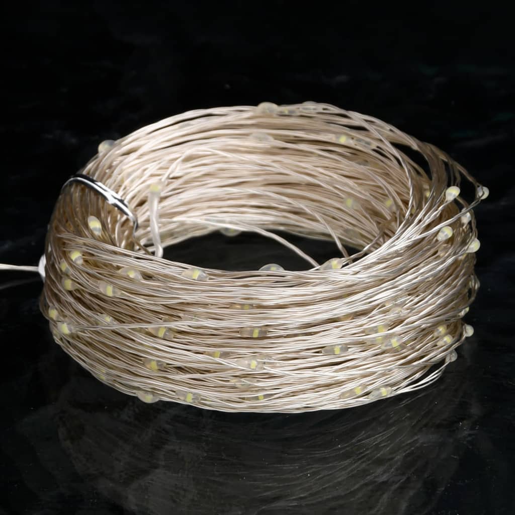 A coil of 49.2ft copper wire string lights with 150 cold white LEDs and remote.