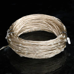 Coiled 49.2ft blue LED string lights with 150 LEDs on copper wire.