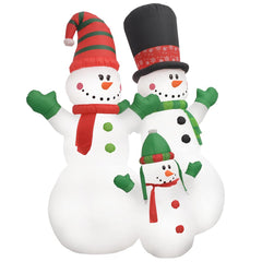 An 8-foot inflatable snowmen family with LED multicolor lights and holiday scarves.
