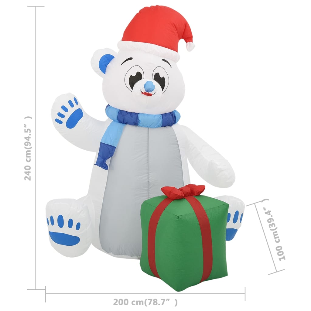 8ft inflatable polar bear wearing a hat and scarf, illuminated by energy-saving LED lights.