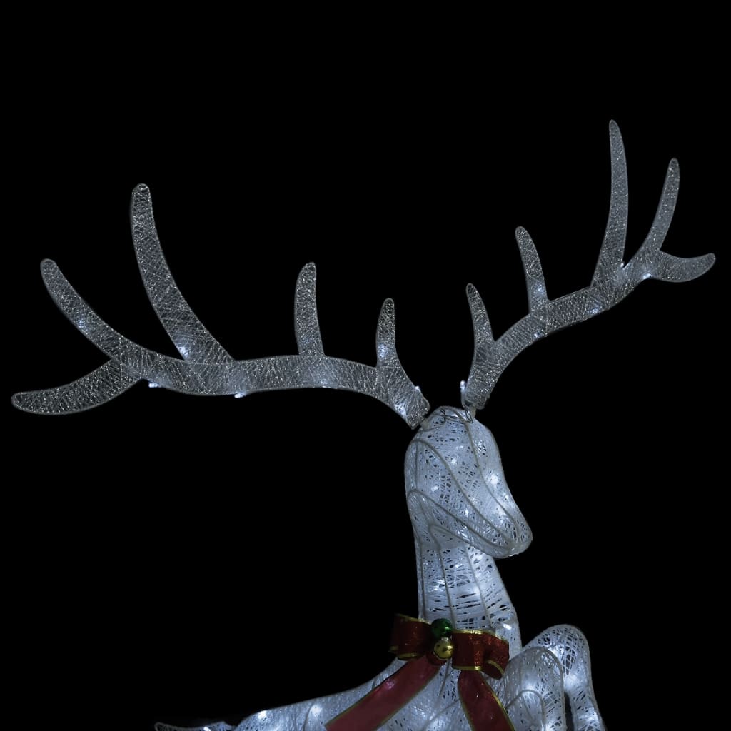 A white LED light-up reindeer decoration with a red bow, against a black background.